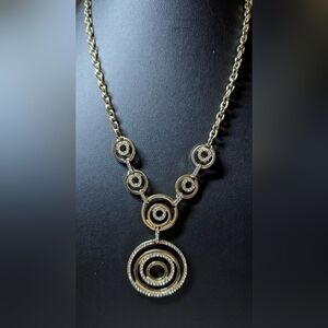A Macy's sparkling crystal and golden necklace NWT.